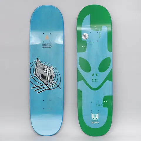 Alien Workshop Exp Green skateboard deck: Top graphic shows a large green alien head between two stylised profile faces forming the lettering Alien Workshop, with an EXP logo at the tail. The underside has a black and white striped alien-cat head in rings.