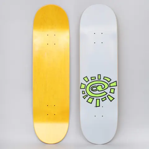 Always @Sun Grey skateboard deck: Light grey deck with a lime green sun made from an at symbol with chunky rays and black outlines, placed low on the deck. Underside shows a plain yellow stain.