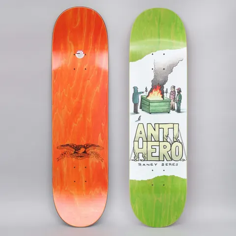 Anti Hero Beres Expressions skateboard deck: Pen-and-ink style scene of four people warming themselves around a burning green dumpster with a plume of smoke, a rat on the ground, above large cream 'ANTI HERO' lettering, on a white torn-paper panel over a green-stained deck. Orange underside with eagle logo also shown.