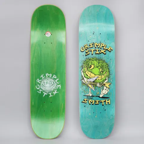 Anti Hero Grimple Evan Family Band skateboard deck: Fuzzy green Grimple creature with a toothy grin playing a flying V guitar, below yellow Grimple Stix lettering and Evan Smith's name. The photo shows the teal top graphic beside a green underside with a Grimple Stix logo.