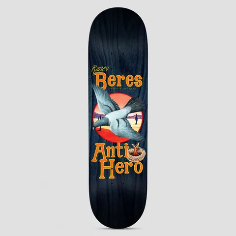 Anti Hero Raney Homers skateboard deck: Painted pigeon flying across a red sun and desert landscape with cacti, above a nest with a chick, on a navy-stained deck. Raney Beres in orange lettering at the top and Anti Hero at the bottom.
