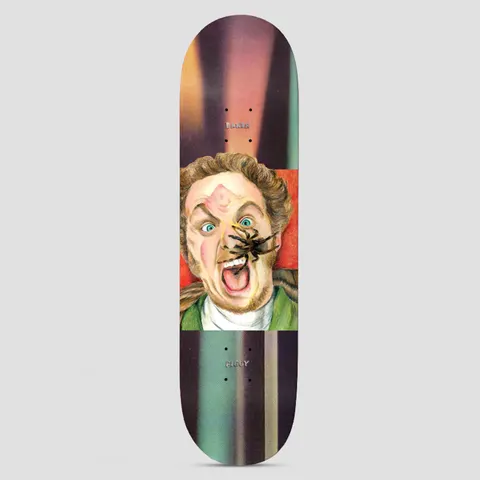 Baker Justin Figgy Figueroa Block Busters skateboard deck: Painted portrait of a screaming curly-haired man in a green jacket with a large tarantula on his face, in a square panel on a blurred purple, green and brown striped deck, with small Baker and Figgy text.