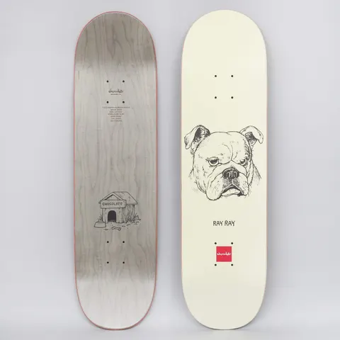 Chocolate Raven Tershy Big Dawg Cream skateboard deck: A black ink drawing of a grumpy bulldog's head on a cream deck, with Ray Ray beneath and the red Chocolate square logo near the tail. The underside shows a drawn kennel.