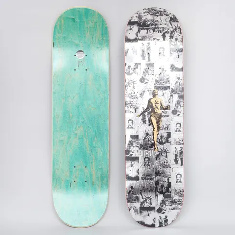 Fucking Awesome Running skateboard deck: A black and white collage of newspaper-style photos, including the Statue of Liberty, portraits and crowds, with a gold classical figure running across the centre. The photo also shows the teal-stained underside.