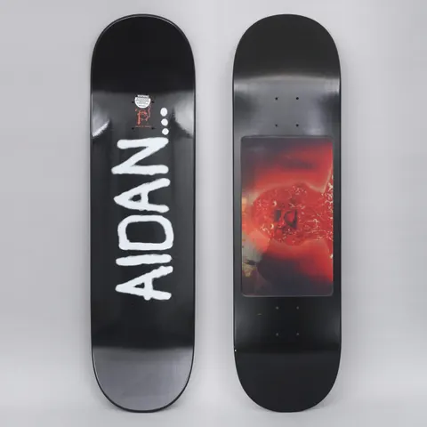Fucking Awesome Aidan Spray Face Black skateboard deck: Black deck with AIDAN followed by three dots in rough white spray-paint lettering running down the length. The underside shown beside it has a red-tinted photographic panel of a face-like figure.