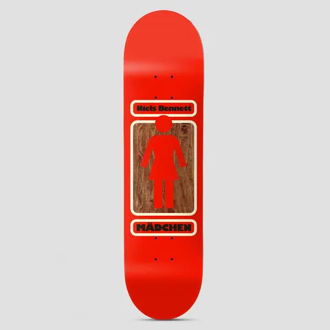 Girl 93 Til W41 Niels Bennett Red skateboard deck: The Girl logo, a red female pictogram, sits on a wood-grain panel in a cream rounded frame, with 'Niels Bennett' above and 'Mädchen' below, on a red deck.