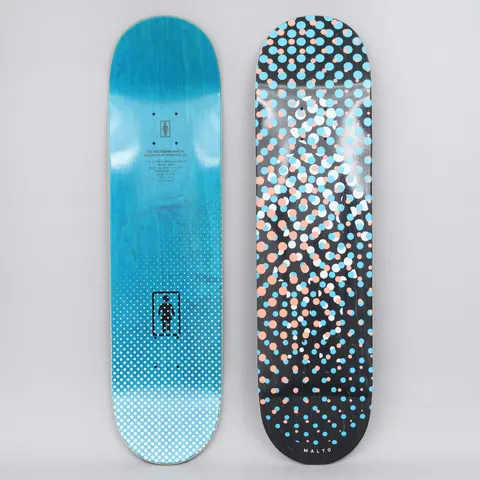 Girl Sean Malto Dot OG skateboard deck: A halftone-style scatter of peach, light blue and white dots across a black deck, with the rider name in small print at the tail. The photo also shows the blue-stained bottom with a halftone fade and Girl logo.