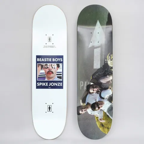 Girl Beastie Boys Spike Jonze #3 skateboard deck: Top graphic shows a colour photo of a group of people in sunglasses lying on tarmac beside a painted white arrow. The other side is white with a framed photo of a moustached man in mirrored sunglasses and a Beastie Boys / Spike Jonze caption.
