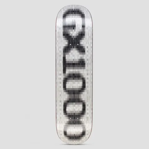 GX1000 OG Logo Blur White skateboard deck: The GX1000 logo as large black vertical lettering, pixelated and blurred over a white and grey mosaic background.