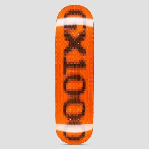 GX1000 OG Logo Blur Orange skateboard deck: Large black GX1000 logo running up the deck, pixelated and blurred as if censored, with white blurred bands at both ends. The ground is a bright orange pixel pattern.