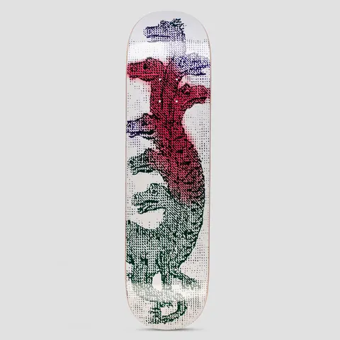 GX1000 Serpents Sean Greene skateboard deck: Stippled halftone illustration of intertwined serpent or dragon-like creatures stacked up the deck, shaded from navy at the top through red to dark green at the bottom, on a white background.