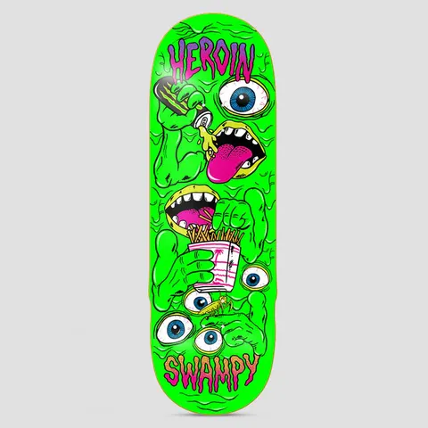 Heroin Swampy Mutate or Die skateboard deck: A wide deck covered in a slimy neon green mutant mass of eyeballs, fists and mouths, one drinking from a can and another eating chips. HEROIN is dripping in purple at the top and SWAMPY at the bottom.
