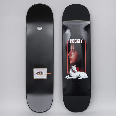 Hockey Kevin Rodriguez Greyhound Black skateboard deck: A black deck with the Hockey logo above a red-framed photo of a woman's profile, with a white greyhound lying below. The underside has a small ashtray with a cigarette and the rider name.
