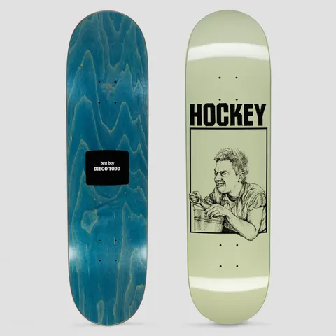 Hockey Diego Todd Bucket Boy Green skateboard deck: Pale green deck with bold black Hockey lettering above a boxed pen-and-ink drawing of a grinning man eating from a bucket. Underside is blue-stained with a black label reading best boy Diego Todd.