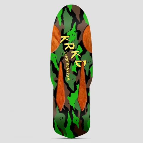 Krooked KR Kamo Diamond Quade Multi skateboard deck: Old-school shaped deck in green, black and brown camouflage with small smiley ghost faces, yellow KRKD Skate Boarding lettering and orange wood-veneer inlays shaped as circles and spikes.