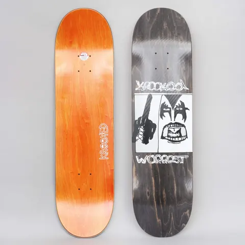 Krooked Worrest Destroyer TT Slick Black skateboard deck: White square panel showing a black-and-white face in rock-band style face paint with bared teeth beside a gloved fist gripping a bat, with scratchy Krooked and Worrest lettering. Black stain; orange bottom shown alongside.