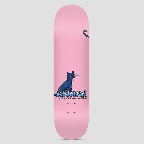 Krooked Cromer Kat Pink skateboard deck: Naively painted blue cat sitting beside the hand-drawn Krooked logo, with its tail curling in at the top right edge, on a plain pink deck.