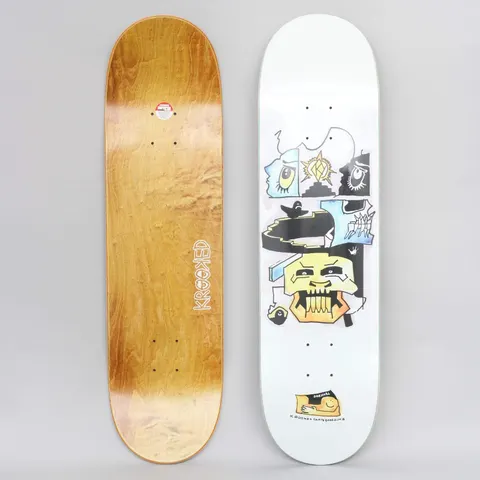 Krooked Drehobl Gibson White skateboard deck: Loose watercolour-style collage on a white deck: a yellow tooth-grinning face at the bottom, with side-profile faces, a star emblem, a stepped pyramid, a black bird and small figures stacked above. Krooked logo on the underside.