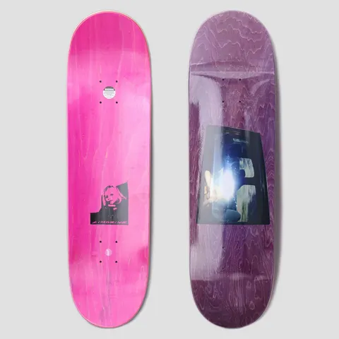 Limosine Cyrus Bennett Window Purple skateboard deck: Purple-stained deck with a photograph of a bright-lit car window interior with seats, set as a rectangular panel. The underside shows pink stain with a small black portrait of a blonde woman.