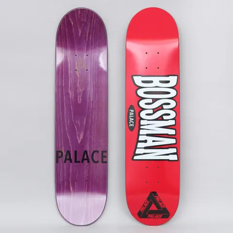 Palace Bossman Red skateboard deck: A red deck with large white outlined, curved Bossman lettering over a small black Palace oval, and the Palace triangle logo in black at the tail. The underside is purple-stained with Palace text.