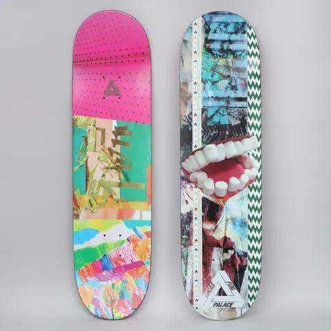 Palace Lucas Pro S21 skateboard deck: Torn paper collage in teal, blue and grey, with a large open mouth of white marshmallow teeth in the middle and a green zigzag stripe along one edge. Palace triangle logo and 'Lucas Puig' at the bottom; the underside is pink, green and rainbow collage.