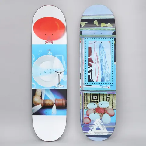 Palace Clarke Pro S21 skateboard deck: A collage of panels in blues, with a child-like drawing in a starry frame, a cluster of pale eggs and decorative borders, topped with a Palace triangle logo and rider name. The other side shows a red oval, a plate and wine glass, and a rusty tap spraying water.