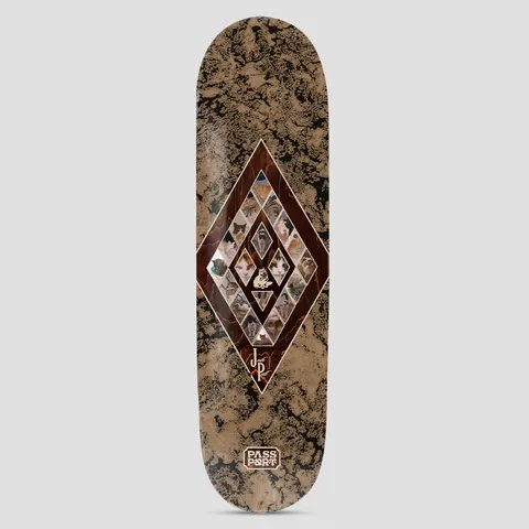Passport Josh Yearbook Series skateboard deck: A brown diamond frame inlaid with small diamond-shaped photos of cats, with a tiny cat figure in the centre, on a marbled brown and black deck. Small signature and Passport logo.