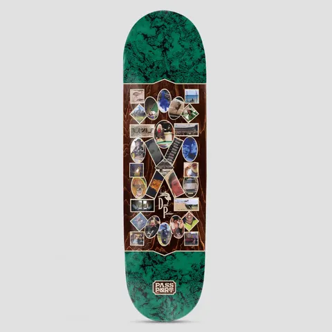 Passport Dean Yearbook Series skateboard deck: Green marbled deck with a brown wood-grain central panel filled with an X-shaped arrangement of oval, square and diamond photo frames in a yearbook style, with Dean Palmer's signature mark and the Passport logo at the bottom.