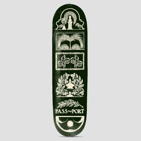 Passport Rubbings Series Front Yard skateboard deck: A dark green deck printed in cream with a vertical stack of rubbing-style panels: an arch with a fountain and palms, a palm fan, roses, a leaf wreath, a sprig and a crescent with a sun. Passport wordmark near the bottom.
