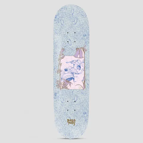 Passport x May Gibbs 8.0 Webbed Bed skateboard deck: A pale blue deck covered in a blue line drawing of gumnut blossoms and flowers, with a central pink panel showing two storybook fairy figures caught in a spider web among bell flowers. Passport logo at the tail.