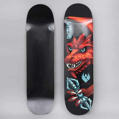 Powell Peralta Peralta 8.25 Cab Dragon Wing 243 Flight skateboard deck: A red engraved-style dragon head with pale blue eyes and bared teeth, wing spread behind it, clutching a pale blue vajra in its claw. Vertical blue kanji-style lettering and a Flight logo sit on a black ground.