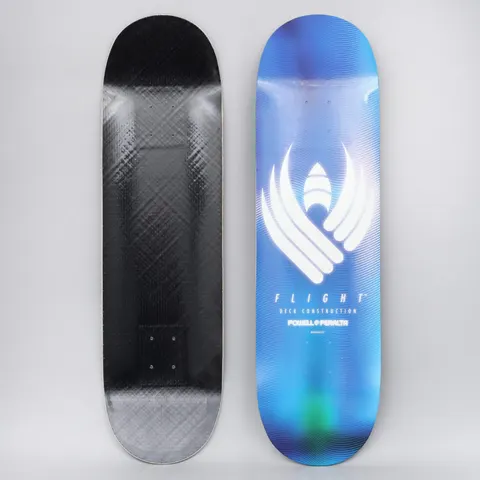Powell Peralta Peralta 9 Glow Flight Blue skateboard deck: Large white winged Flight emblem on a blue holographic, rippled-finish deck with green and purple glints, with small Flight Deck Construction and Powell Peralta text beneath.