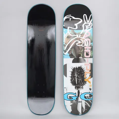 Quasi Quasi 8.25 Crockett Acid Ply Blue skateboard deck: Collage on a black deck: a white line-drawn dog's head and peace-sign hand, a photo of a decorated horse, and a spiky seed-head image, with 'Acid-Ply' lettering and a large blue 'GC' mark. The photo shows the plain black underside beside it.