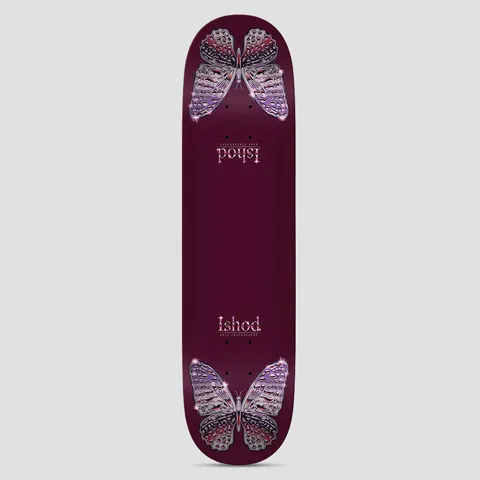 Real Ishod Mariposa Chrome Redux Twin Tail Maroon skateboard deck: Two sparkly chrome-effect butterflies with lilac and red wings sit at the nose and tail of a maroon deck, with the rider name in decorative type near each end, the nose one upside down.