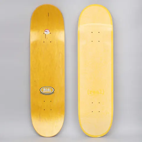 Real Flowers Renewal Yellow skateboard deck: Tone-on-tone yellow deck with a faint floral and foliage pattern and a yellow '(real)' wordmark near the tail. Photo also shows the underside with a Real oval 'Renewal Edition' logo.