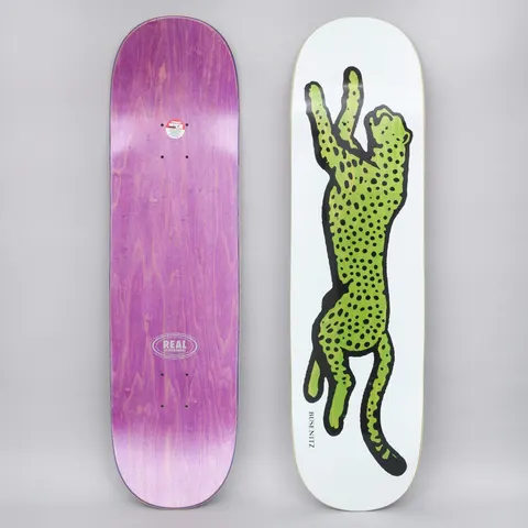 Real Busenitz Prey II White skateboard deck: Large green leaping cheetah with black spots and thick black outline on a white deck, with BUSENITZ in small lettering beside it. The underside is purple with a Real logo.