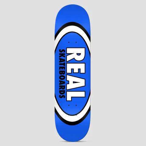 Real Team Classic Oval Blue skateboard deck: Real Skateboards classic oval logo with white REAL lettering and SKATEBOARDS in black running vertically inside concentric white and black rings, on a bright blue deck.