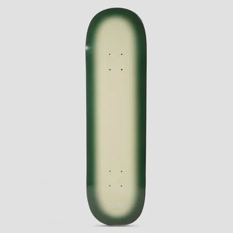 Skateboard Cafe Fade Ecru / Forest Green skateboard deck: Plain ecru deck with a soft airbrushed forest green fade around the edges, and a small white 'café' wordmark near the tail.