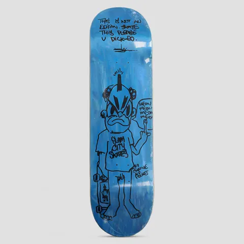 Slam City x Slawn 8.00 No Pockets Assorted Colours skateboard deck: A black marker drawing on a blue-stained deck of a scowling mohawked character in a Slam City Skates T-shirt, one hand raised with a speech bubble and a skateboard in the other. Handwritten lines run across the top.