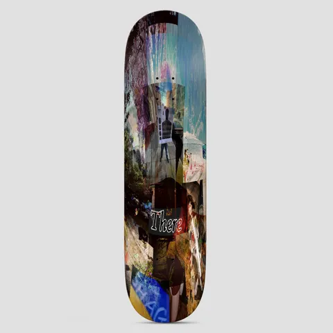 There Shag Sees All skateboard deck: Layered, blurred photo collage of street scenes, trees, sky and a target silhouette, with the word There in white outlined italic script near the middle and a blue graffiti-style tag near the tail.