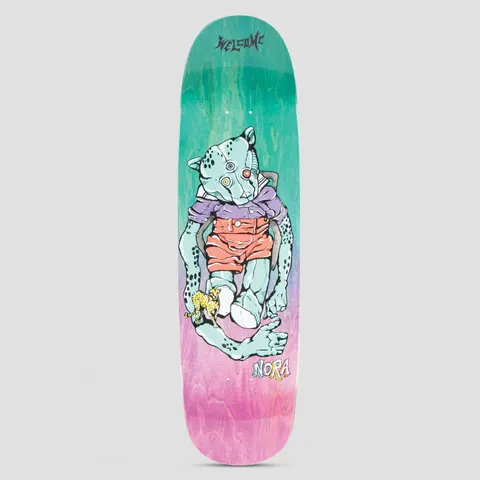 Welcome Teddy Nora Teal / Purple Gradient Stain skateboard deck: A mint-green leopard-headed teddy bear with mismatched eyes, in a purple shirt and coral shorts, sits slumped with long limbs, holding a tiny cheetah. Welcome logo above, Nora below, on a teal-to-pink stained deck.