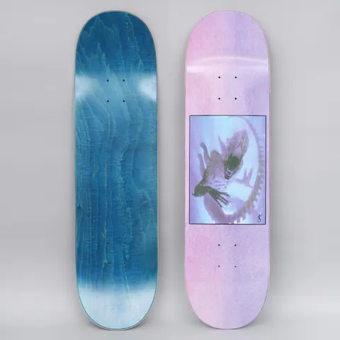 Yardsale Evolution B Purple skateboard deck: A framed, hazy illustration of a xenomorph-style alien creature curled in a ring on a pastel pink-to-lilac gradient with a grainy texture, signed in the corner.