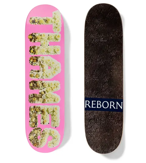 Thames MMXX Reborn Hubba Bubba skateboard deck: Pink deck with 'Thames' in large block capitals made of cream and white roses and flowers, like a funeral tribute. The underside is a dark gravel texture with a navy band reading 'Reborn'.