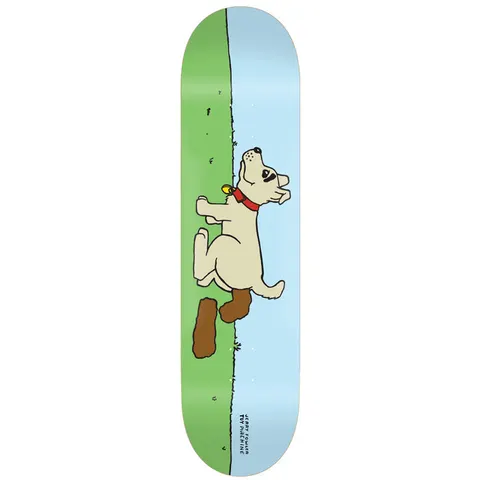 Toy Machine Jerry Fowler Poop 8.25 skateboard deck: Simple cartoon of a cream-coloured dog with a red collar squatting on grass beside a brown pile, under a pale blue sky. Rider name and brand printed small along the tail.