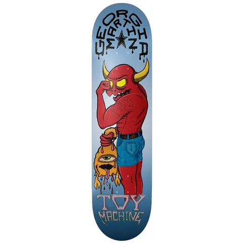 Toy Machine Georgia Martin Monster 8.25 skateboard deck: A muscular red horned devil in blue shorts holds a dripping orange one-eyed monster by the hair, wiping its own glowing yellow eye. Dripping gothic rider name arches over a star at the top on a blue gradient.