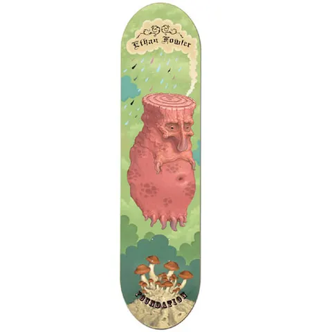 Foundation Fowler Creep skateboard deck: Pink stump-headed creature with a sad face, tentacle-like feet and a smoking chimney, floating amid coloured raindrops in a green cloudy sky, with a cluster of mushrooms at the bottom.