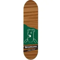 Toy Machine Layton Betard skateboard deck: Wood-grain brown deck with a green panel at the tail holding a white line drawing of a bear-like head and shoulders with an open mouth. Toy Machine label in a black strip below.