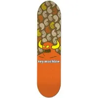 Toy Machine Paisley skateboard deck: Orange horned Toy Machine monster rising from a solid orange lower half, with a brown upper half patterned with paisley shapes in cream, orange and mustard. Toy Machine logo sits across the middle.