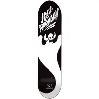 Toy Machine Harmony Ghost skateboard deck: Black deck with a large white ghost shape swooping down the length, a horned Toy Machine monster skull face on its head. Dripping white lettering at the top names the rider.