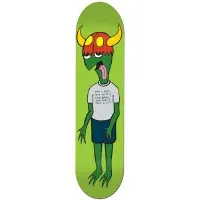 Toy Machine Lurk Fest skateboard deck: Green lizard-like cartoon character with a horned red helmet, drooping tongue and clawed hands, wearing a white t-shirt with small printed text and navy shorts, on a lime green background.